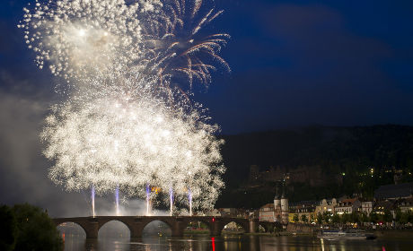 A photograph of fireworks at night above the Old Bridge. 