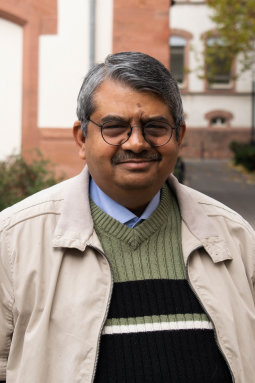 Prof Mukherji