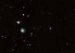 Abb.2 Ausschnitt aus dem GEMS-Survey, einer tiefen Durchmusterung des Himmels mit dem Hubble Weltraumteleskop zur Untersuchung ferner Galaxien und deren Entwicklung